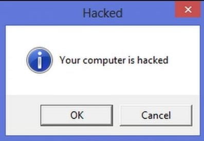 Παράθυρο Windows με το μήνυμα Your computer is hacked, παράδειγμα μόλυνσης από malware
